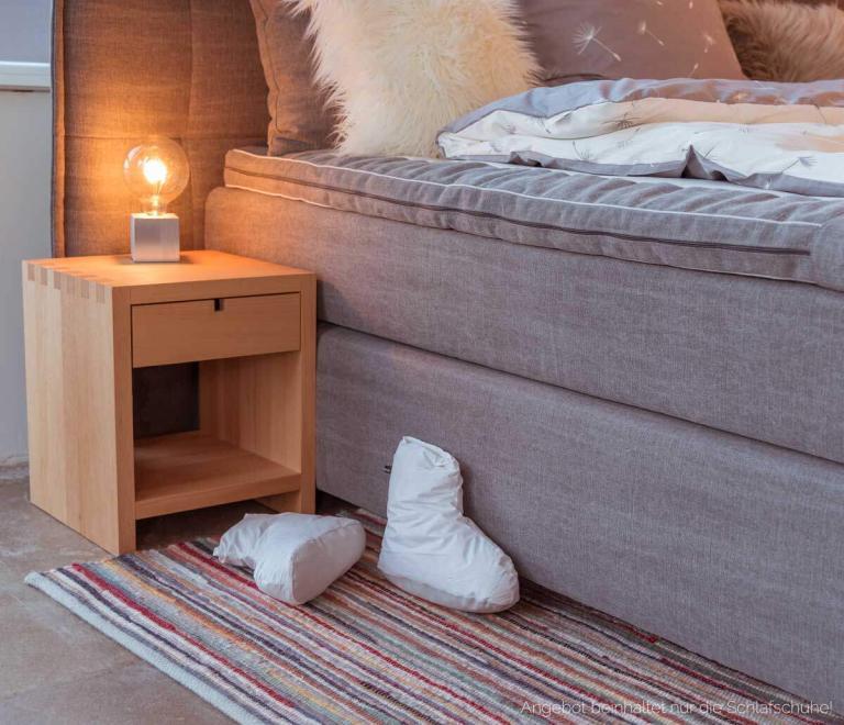 Schlafschuhe gefüllt mit Daunen